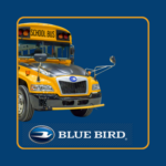 Reid-Reid INC School Bus Rentals Blue Bird School bus side view front logo, background black